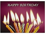 Happy Birthday card with lit birthday candles