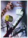 Happy Birthday card with noisemakers on front